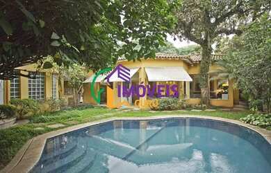 Imagem: A casa possui 3 Dormitórios, 4 Banheiros, 4 Vagas na garagem