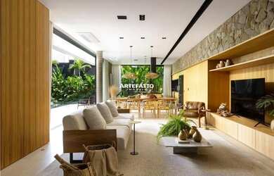 Imagem: A casa possui 3 Dormitórios, 5 Banheiros, 4 Vagas na garagem