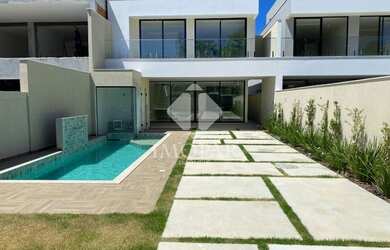 Imagem: A casa em condomínio possui 5 Dormitórios, 5 Banheiros, 3