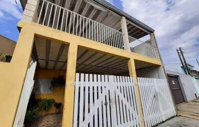 Imagem: A casa possui 3 Dormitórios, 3 Banheiros, 2 Vagas na garagem