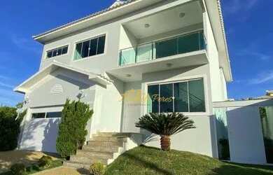 Imagem: A casa em condomínio possui 5 Dormitórios, 4 Banheiros, 2