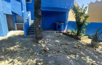 Imagem: A casa possui 3 Dormitórios, 2 Banheiros, 1 Vaga na garagem