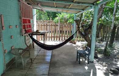 Imagem: A casa possui 3 Dormitórios, 2 Banheiros e está localizado