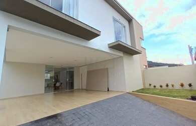 Imagem: A casa possui 4 Dormitórios, 4 Banheiros, 2 Vagas na garagem