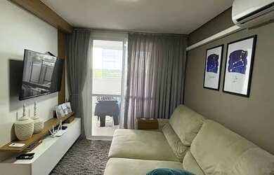 Imagem: O apartamento possui 2 Dormitórios, 1 Banheiro, 1 Vaga na garagem