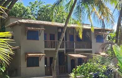 Imagem: A casa possui 4 Dormitórios, 4 Banheiros, 5 Vagas na garagem