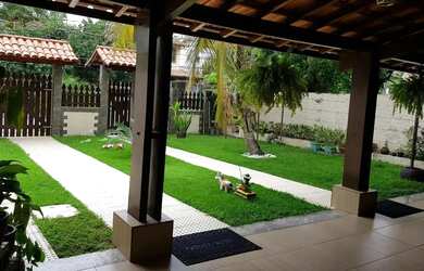 Imagem: A casa possui 3 Dormitórios, 4 Banheiros, 2 Vagas na garagem