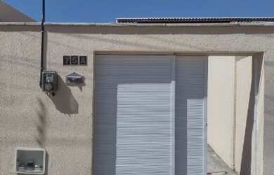 Imagem: A casa possui 2 Dormitórios, 2 Banheiros, 1 Vaga na garagem