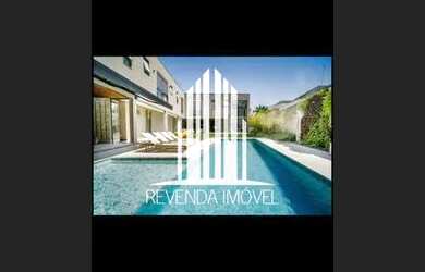 Imagem: A casa possui 5 Dormitórios, 5 Banheiros, 5 Vagas na garagem