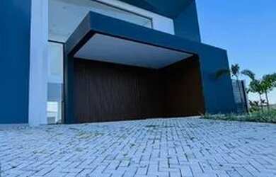 Imagem: A casa em condomínio possui 4 Dormitórios, 4 Banheiros, 2