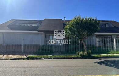 Imagem: A casa possui 2 Dormitórios, 3 Banheiros, 3 Vagas na garagem