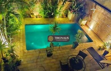 Imagem: A casa possui 3 Dormitórios, 3 Banheiros, 2 Vagas na garagem