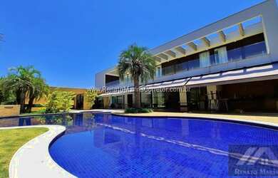 Imagem: A casa em condomínio possui 5 Dormitórios, 5 Banheiros, 5