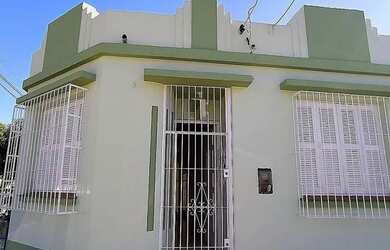 Imagem: A casa possui 2 Dormitórios, 1 Banheiro, 1 Vaga na garagem