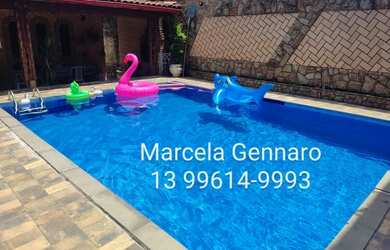 Imagem: A casa possui 3 Dormitórios, 5 Vagas na garagem, Churrasqueira