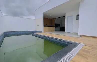 Imagem: A casa em condomínio possui 3 Dormitórios, 4 Banheiros, 3