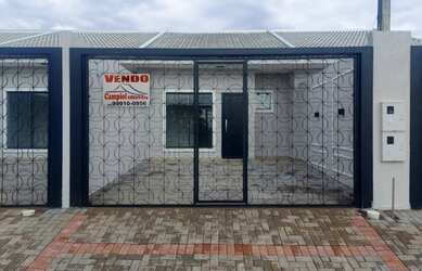 Imagem: A casa possui 3 Dormitórios, 1 Banheiro, 2 Vagas na garagem