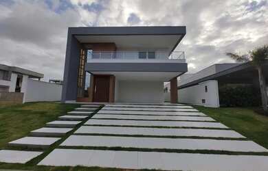 Imagem: A casa em condomínio possui 5 Dormitórios, 5 Banheiros, 4