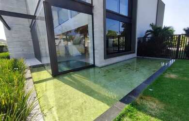 Imagem: A casa em condomínio possui 5 Dormitórios, 5 Banheiros, 4