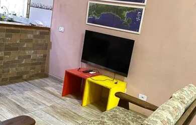 Imagem: A casa possui 2 Dormitórios, 1 Banheiro, 1 Vaga na garagem