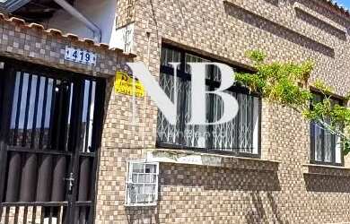 Imagem: A casa possui 5 Dormitórios, 4 Banheiros, 2 Vagas na garagem