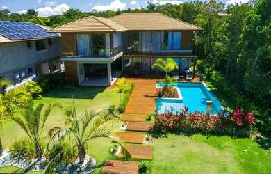 Imagem: A casa em condomínio possui 5 Dormitórios, 5 Banheiros, 4