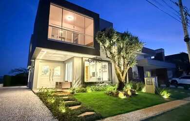 Imagem: A casa em condomínio possui 4 Dormitórios, 5 Banheiros, 2