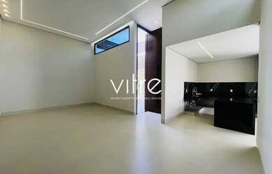 Imagem: A casa possui 3 Dormitórios, 4 Banheiros, 3 Vagas na garagem