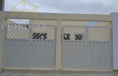 Imagem: A casa possui 3 Dormitórios, 2 Banheiros, 2 Vagas na garagem