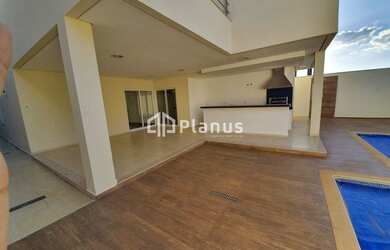 Imagem: A casa possui 4 Dormitórios, 5 Banheiros, 2 Vagas na garagem