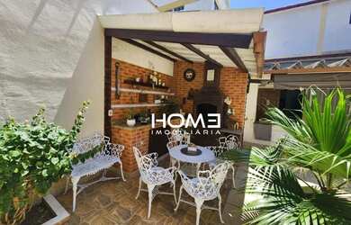 Imagem: A casa possui 5 Dormitórios, 5 Banheiros, 4 Vagas na garagem