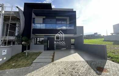 Imagem: A casa em condomínio possui 3 Dormitórios, 4 Banheiros, 4