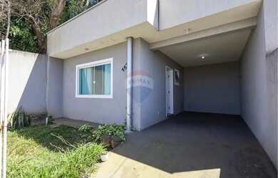 Imagem: A casa possui 2 Dormitórios, 1 Banheiro, 2 Vagas na garagem