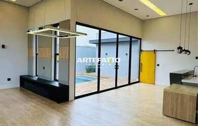 Imagem: A casa possui 3 Dormitórios, 2 Banheiros, 4 Vagas na garagem