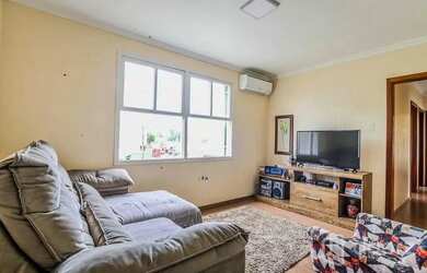 Imagem: O apartamento possui 3 Dormitórios, 1 Banheiro, 1 Vaga na garagem