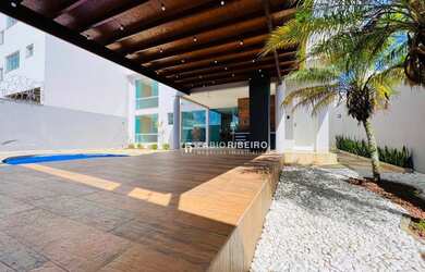 Imagem: A casa possui 3 Dormitórios, 4 Banheiros, 4 Vagas na garagem