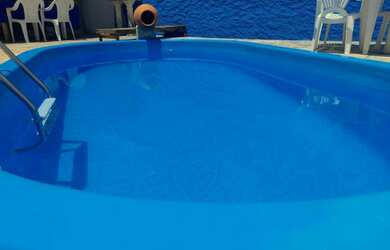 Imagem: A casa possui 3 Dormitórios, 5 Vagas na garagem e está localizado