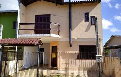 Imagem: A casa possui 3 Dormitórios, 2 Banheiros, 1 Vaga na garagem