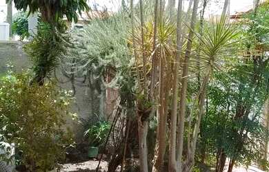 Imagem: A casa possui 4 Dormitórios, 1 Banheiro, 3 Vagas na garagem