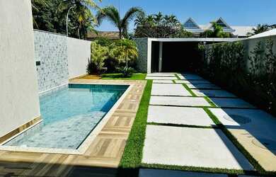 Imagem: A casa em condomínio possui 4 Dormitórios, 5 Banheiros, 360m²