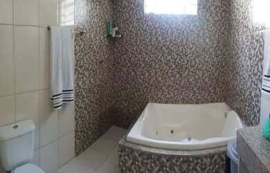 Imagem: A casa possui 4 Dormitórios, 4 Banheiros, 3 Vagas na garagem