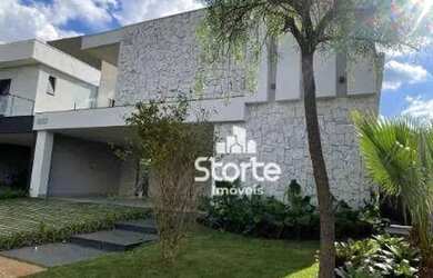 Imagem: A casa em condomínio possui 4 Dormitórios, 5 Banheiros, 4