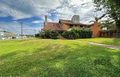 Imagem 11: Icônica Casa para comprar a poucos metros do mar em Atlântida