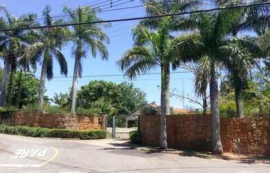 Imagem: A casa possui 4 Dormitórios, 5 Banheiros, 5 Vagas na garagem