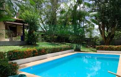 Imagem: A casa possui 4 Dormitórios, 1 Banheiro, 3 Vagas na garagem