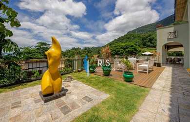 Imagem: A casa possui 5 Dormitórios, 5 Banheiros, 454m² de Área e