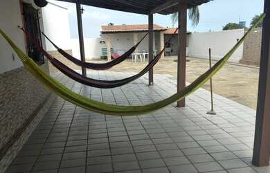 Imagem: A casa possui 5 Dormitórios, 5 Vagas na garagem e está localizado