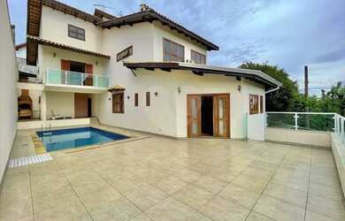 Imagem: A casa em condomínio possui 4 Dormitórios, 5 Banheiros, 5