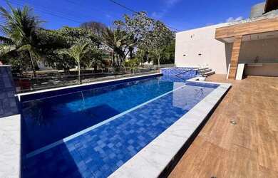 Imagem: A casa possui 5 Dormitórios, 5 Banheiros, 4 Vagas na garagem