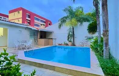 Imagem: A casa possui 4 Dormitórios, 4 Banheiros, 3 Vagas na garagem